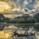 Sunrise over the wading bird rookery at Woody Pond