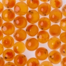 Orange fish eggs on a white background.