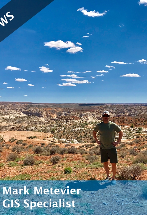 A man standing in the desert. A banner reads "#FacesofUSFWS". Another banner reads "Mark Metevier, GIS Specialist"