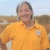 Image of Jane Hendron wearing a gold colored polo shirt