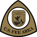 The Federal Recreation Fee Symbol with the FWS Shield in the center.