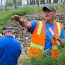Mitch Osborne leads a group around restored sections of Cripple Creek, July 2023