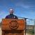 Image of USFWS staff person speaking at podium