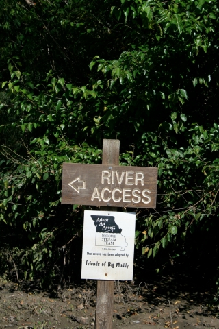 sign pointing which direction to go for river access and friends of big muddy 