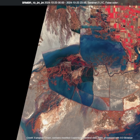 A satellite image depicts water conditions on the refuge shown in an aerial view with areas of water clearly visible.