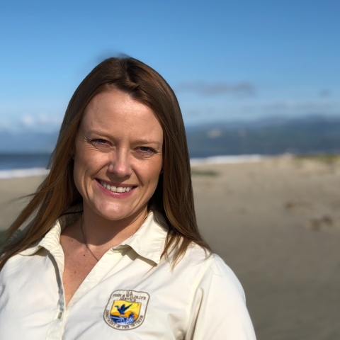 Image of USFWS staff person on beach