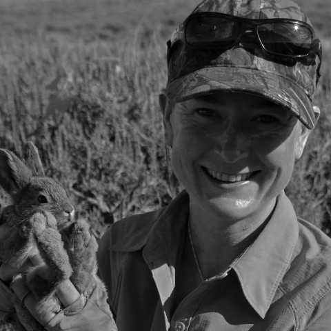 woman holding a rabbit