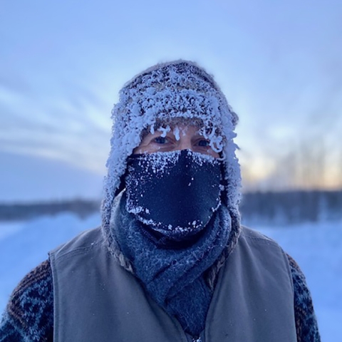 a frosty man with a hat