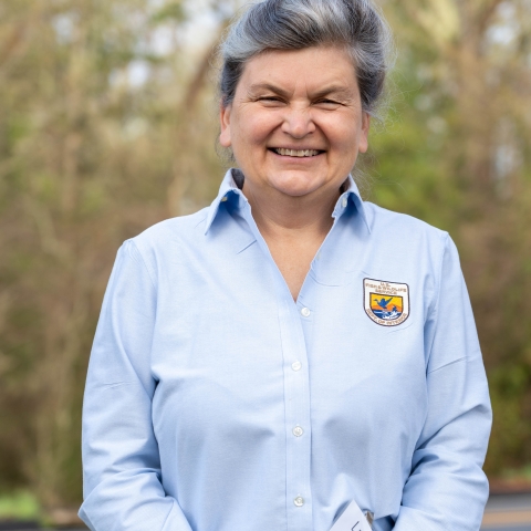 Portrait of lady in a blue shirt