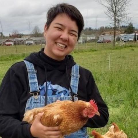 Ollie Zanconico holding a chicken