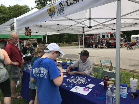 A photo of the USFWS booth at the Mason Neck Eagle Festival.