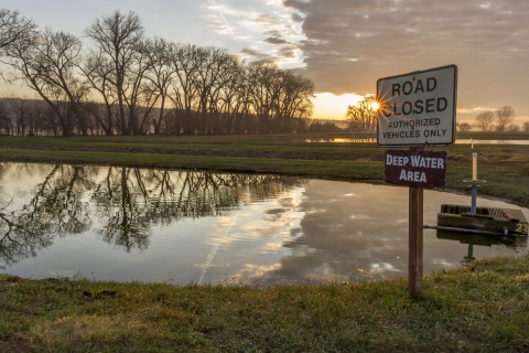 Sunrise over a hatchery pond at Gavins Point National Fish Hatchery