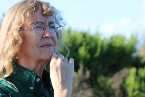 A close up of a woman staring into the distance