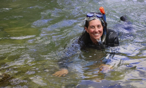 a woman swimming in water