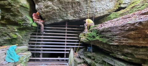 Construction of a bat gate at Devil's Den State Park.