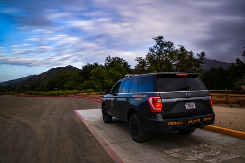 Federal Wildlife Officer vehicle on San Diego NWR parking lot