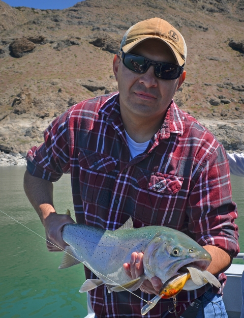 a man holding a large fish