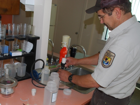 Quilcene National Fish Hatchery staff processing water samples.