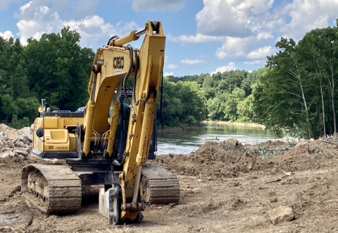 Equipment demolishing lock and dam near Bowling Green, Kentucky.