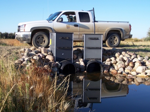 U.S. Fish & Wildlife Service truck parked by water control structures