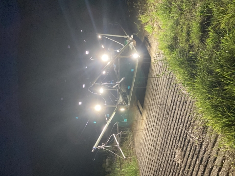 Electrofishing boat with night spot lights on during a evening fish survey