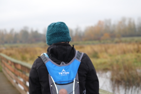 Walker along Kiwa Trail bundled for fall weather