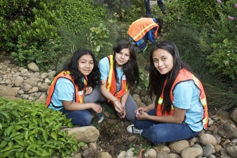 Students from Scott School Elementary in Portland, Oregon, near a stream. 