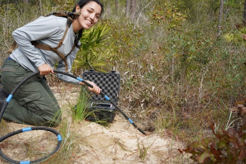 Scoping a gopher tortoise burrow at St. Marks Refuge in Florida