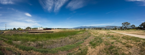 A panorama view of a wide open field