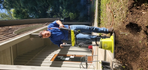 Biologist Bill Lynn begins to prepare the soil.