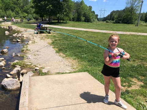 young girl with a fish 