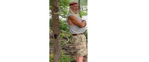 A man poses along the Cahaba River