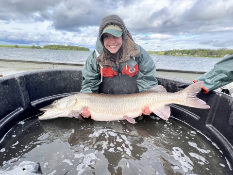 Outreach Coordinator with a musky.