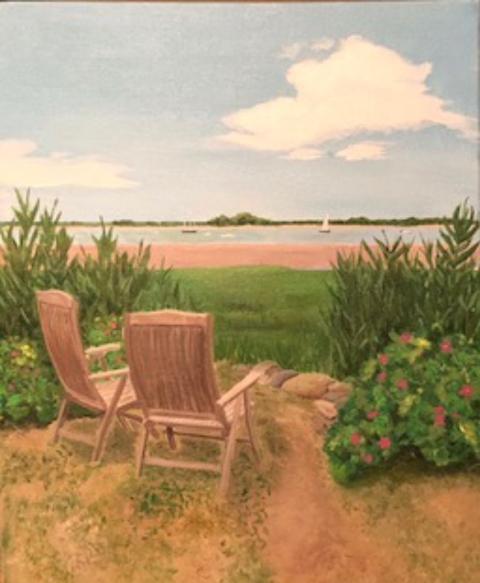 Image of two lawn chairs overlooking the beach and ocean