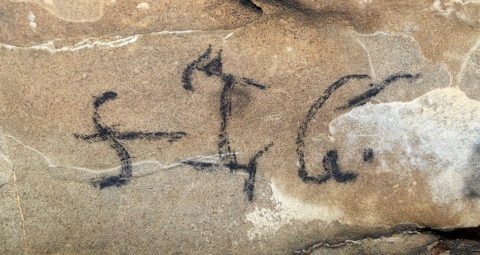 Cherokee writing on a cave wall
