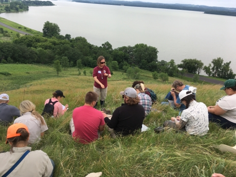 Sara Vacek teaches a prairie plant identification workshop, photo taken by Megan Benage/ MN DNR.  