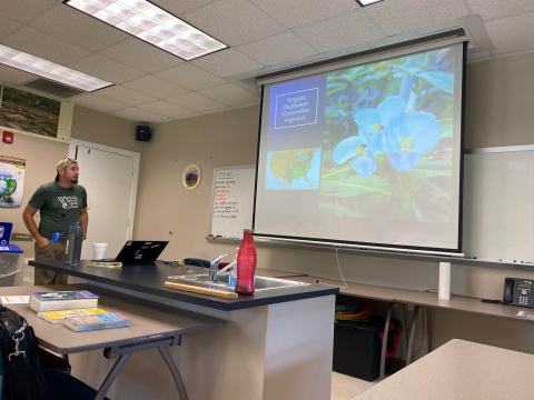 Man giving presentation in a classroom 