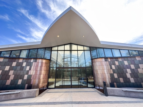 front of a large building with glass