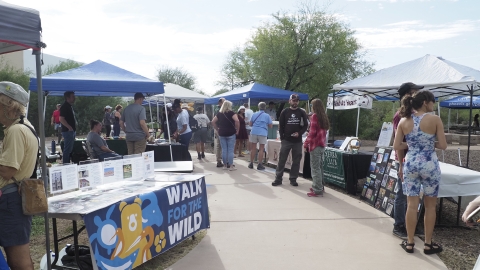 Booths and visiting public at UWCD 2022