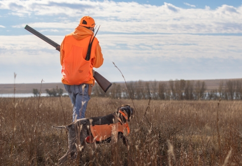 Youth hunter and dog