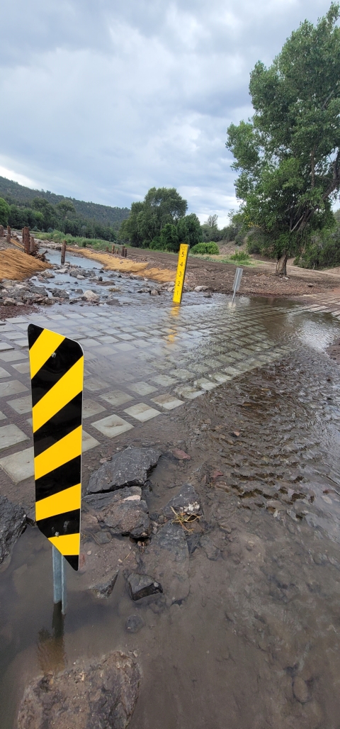 A new low water ford with vegetation mats in the background