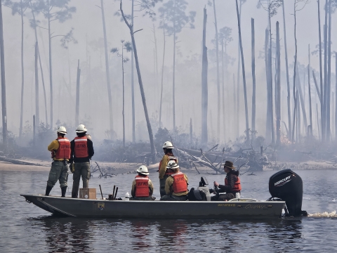 Fire crew on boat