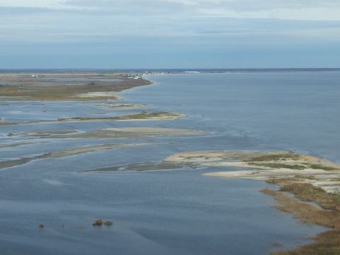 Ocean water flows through a series of land breaches.