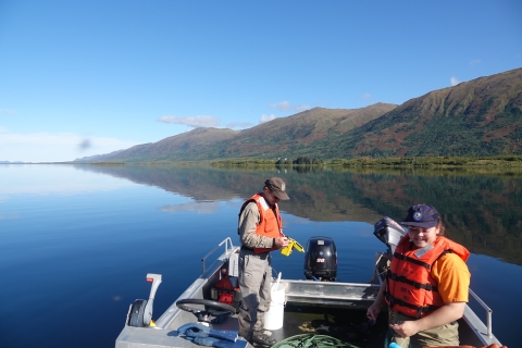 USFWS staff member and volunteer in a skiff in Karluk lake