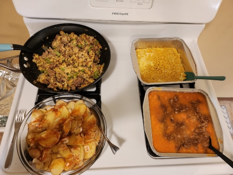 Thanksgiving food on a stove