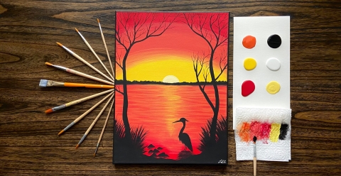 a painting of a bird sillhouette in front of a body of water with trees on each side. The sun is setting in the distance and the sky is glowing yellow and orange