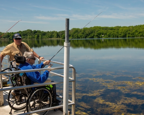 Disabled Veteran Fishing from an accessible boat launch