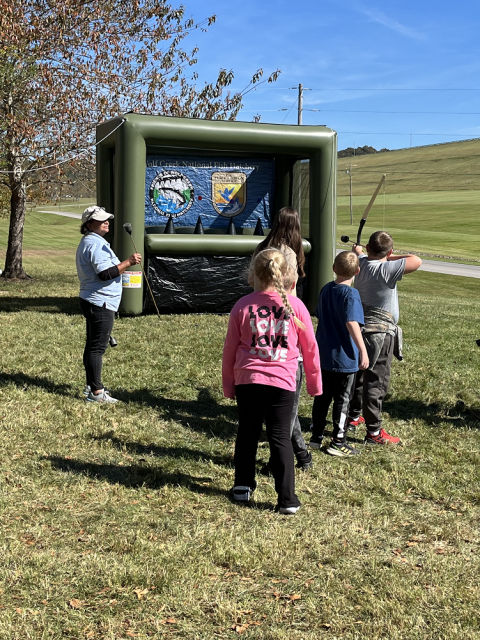 children doing archery