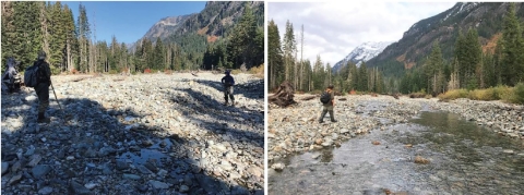 Scenic view of two individuals trekking by a river in the mountains.