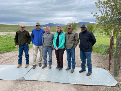 L to R: David Mannix, Landowner; USDA-FPAC Under Secretary Robert Bonnie; Jim Stone, Landowner; U.S. Fish and Wildlife Service Director Martha Williams; Wayne Slaght, Landowner; NRCS Chief Terry Cosby standing on electric mat